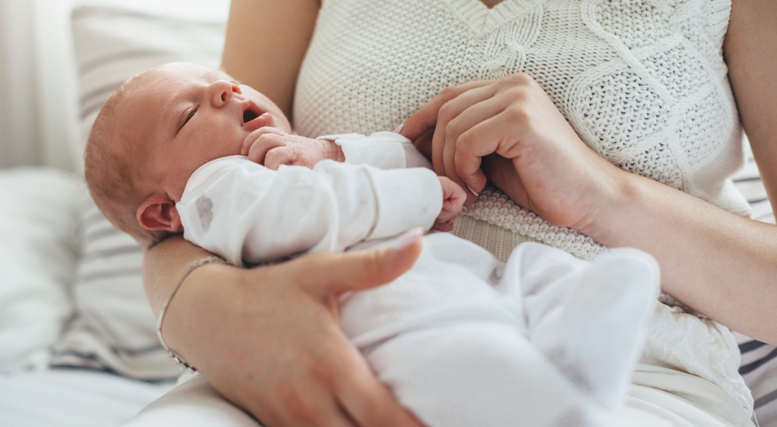 How to hold a newborn baby